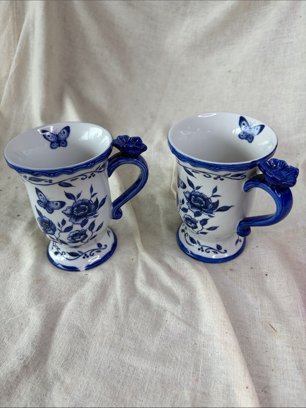 Blue Floral Ceramic Mugs with Butterfly Accent - Set of 2